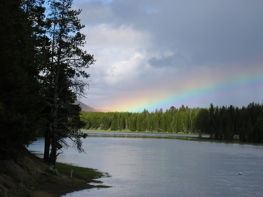 rainbow over a lake